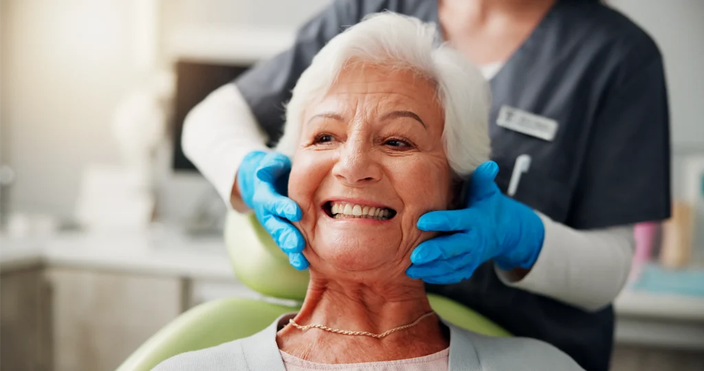 Smiling senior woman having a dental check-up